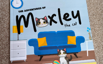 photo of Moxley the cat book